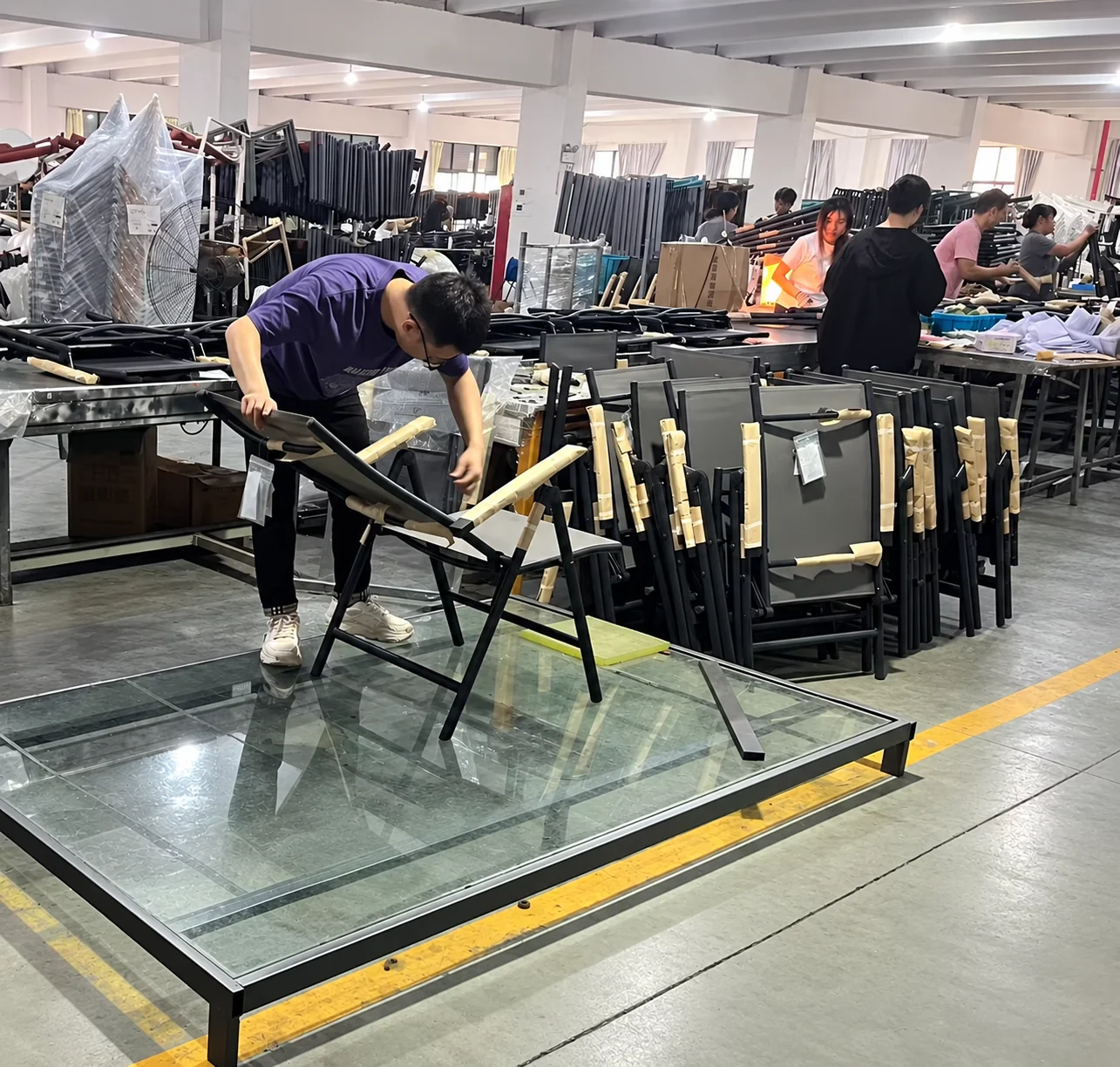 Furniture assembly checks on the factory floor.