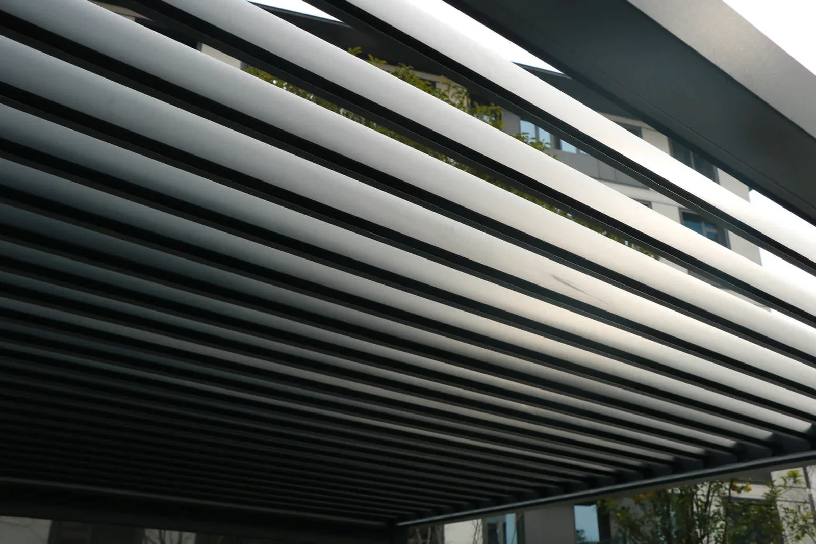 Close view of adjustable pergola roof louvres